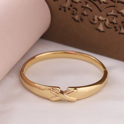 Elora Gold Plated Grace Cross-Knot Bangle