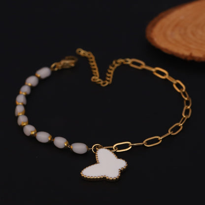 Elora Golden Dual Chain Bracelet with White Butterfly Charm
