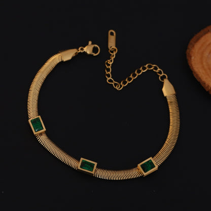 Elora Gold Plated Herringbone Bracelet with Green Emerald-Style Stones