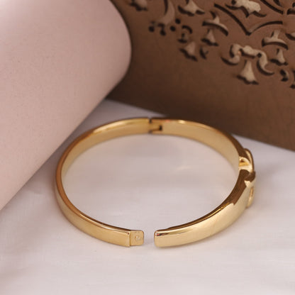 Elora Gold Plated Grace Cross-Knot Bangle