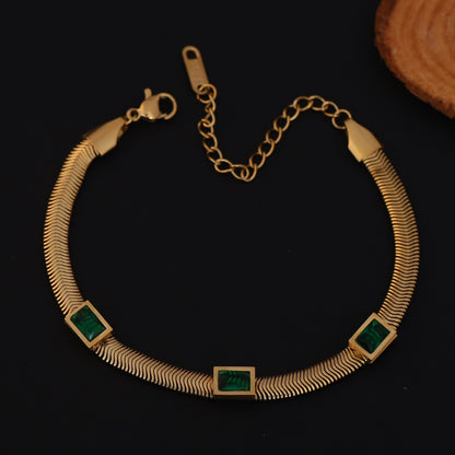 Elora Gold Plated Herringbone Bracelet with Green Emerald-Style Stones
