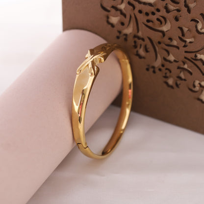 Elora Gold Plated Grace Cross-Knot Bangle