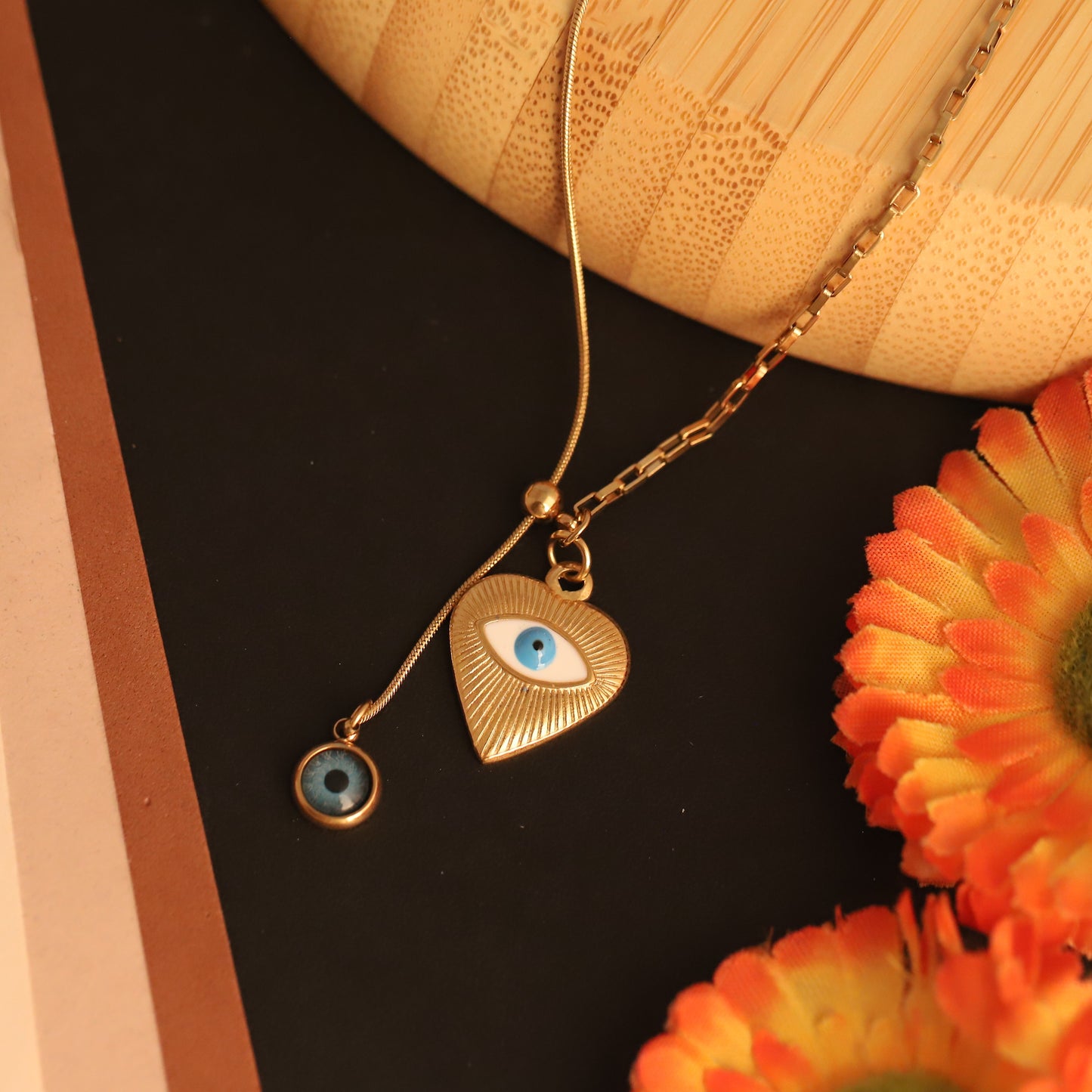 Elora Gold plated Heart Shape Dual Evil Eye Pendant with dual Style Chain